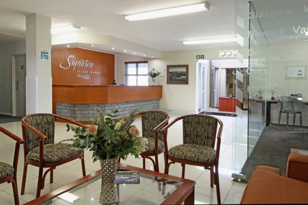 The reception counter with chairs at Signature Flight Support, Cape Town Airport, furnished by Nuwave