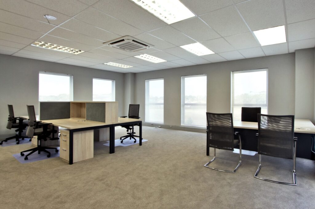 Workstations along the windows at New Approach Medical's Cape Town office, furnished by Nuwave