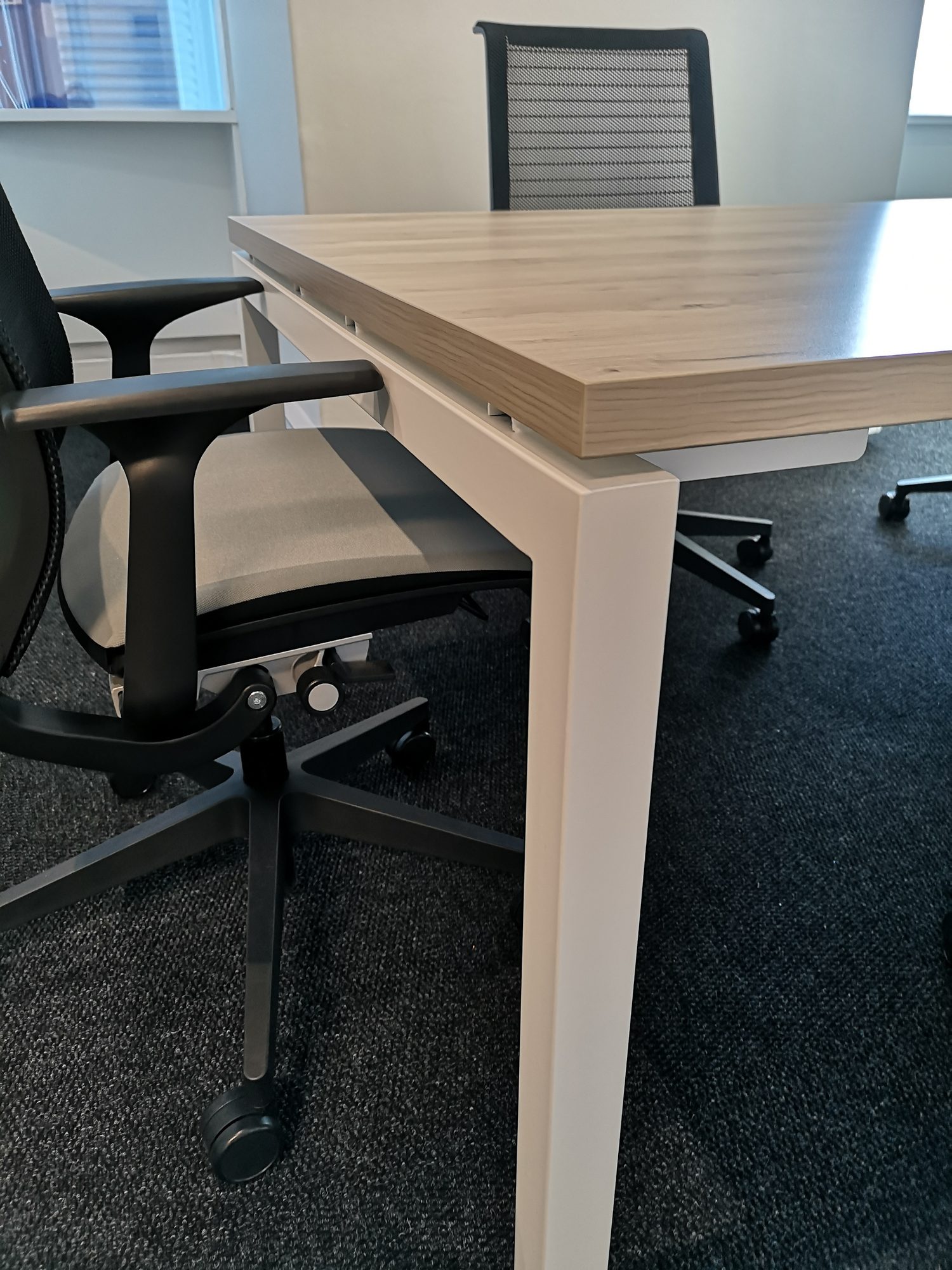 A desk with a task chair by the window at Nordex Energy in Cape Town, furnished by Nuwave