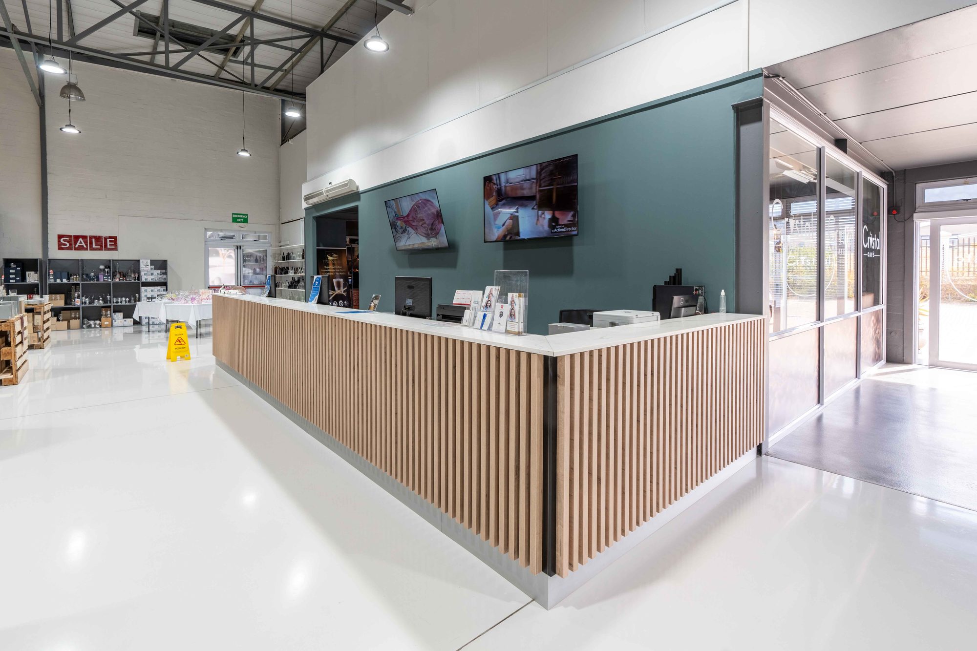 The timber slat reception counter in the Crystal Direct showroom, supplied and installed by Nuwave