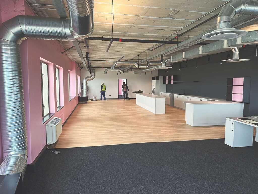 The length of the open plan floor and kitchen runs at Polycat Visual Effects, by Nuwave
