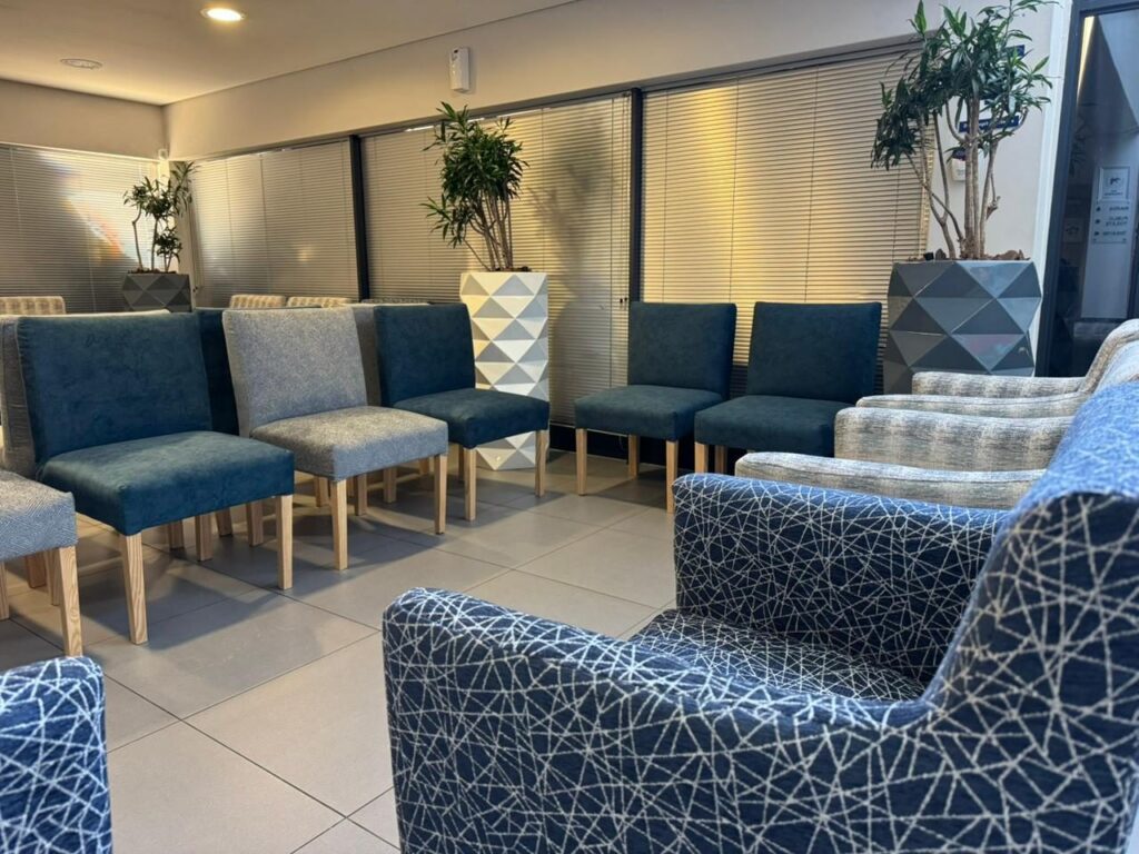 Grouped waiting room seating and side tables at Cure Day Hospital, Bellville, supplied by Nuwave