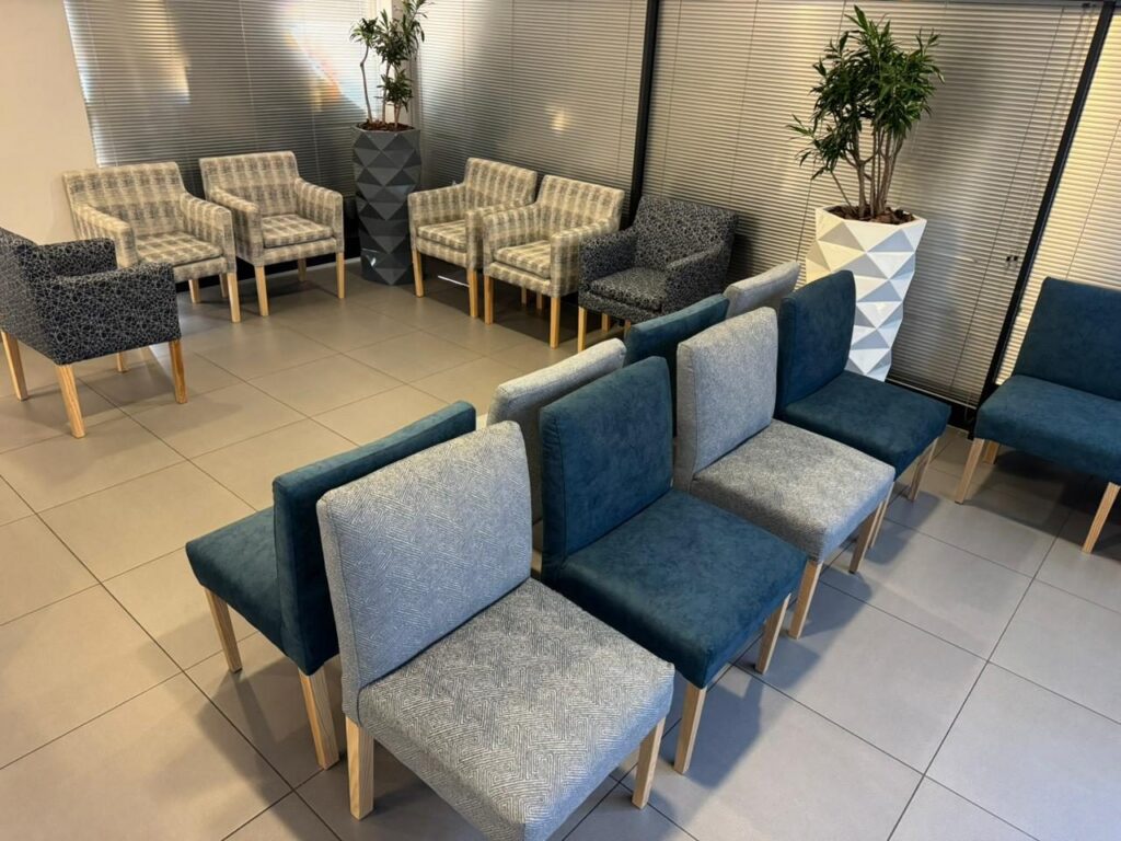 A row of upholstered waiting chairs at Cure Day Hospital in Bellville, delivered by Nuwave