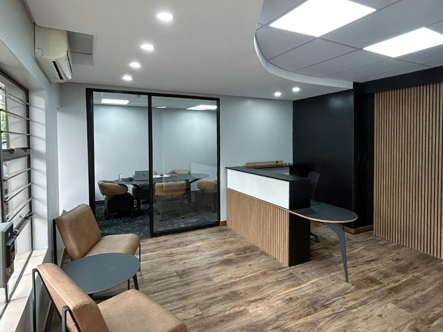 Reception counter with timber slats and waiting seating